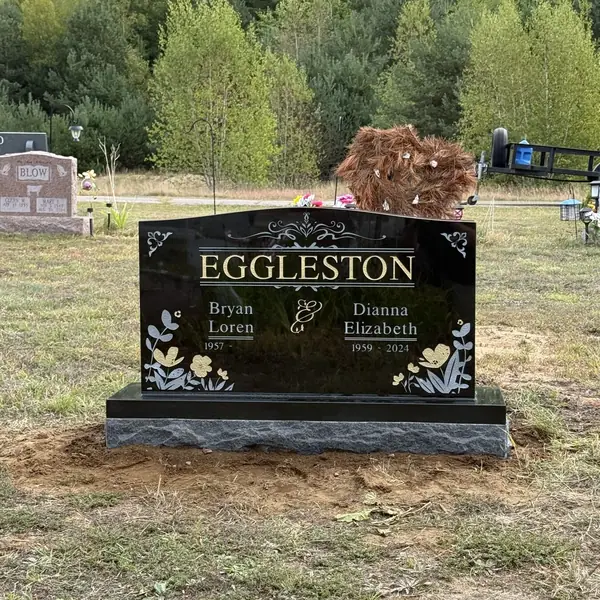 Classic upright granite monument — example 77