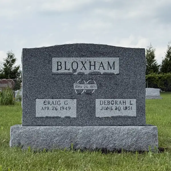 Classic upright granite monument — example 89