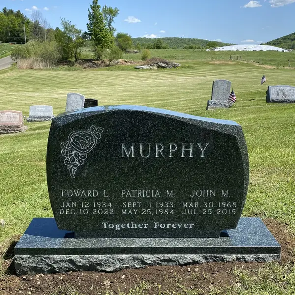 Classic upright granite monument — example 98