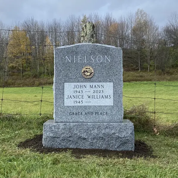 Classic upright granite monument — example 107