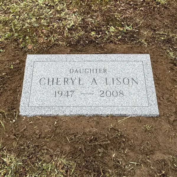 Flat granite marker — Champlain Monuments