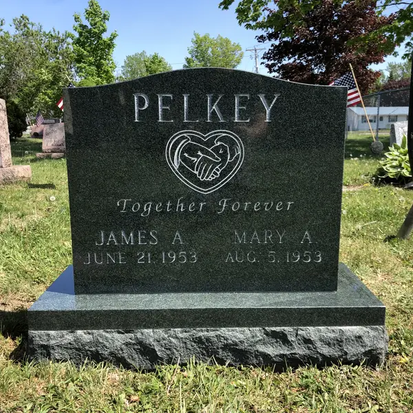 Classic upright granite monument — example 34