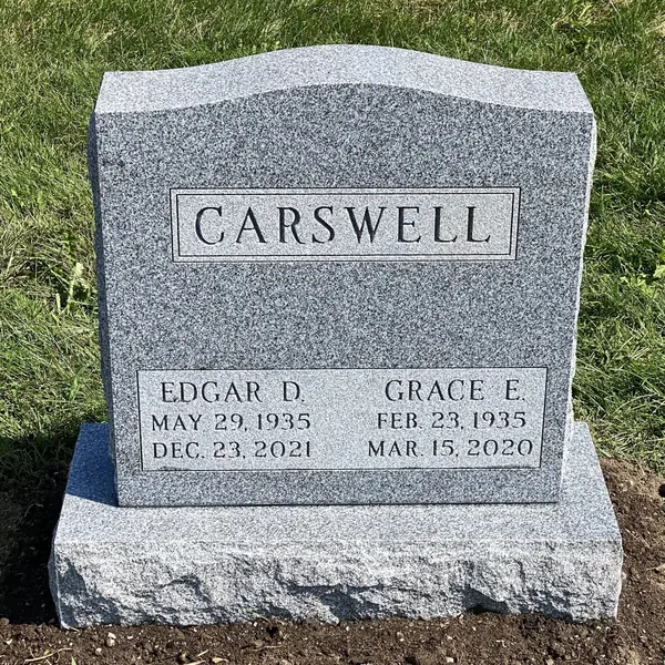 Classic upright granite monument — example 48